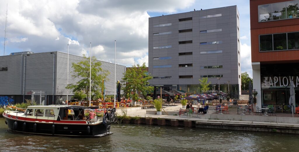 Waterside terraces Klein Berlijn and Taplokaal Gist at Utrecht Rotsoord, with canal views